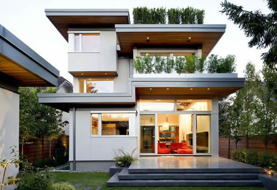 Фото 1 – Двухэтажный каркасный коттедж. Плоская крыша