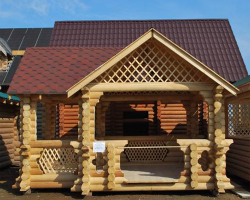 Фото 1 – Уютная беседка из бревна