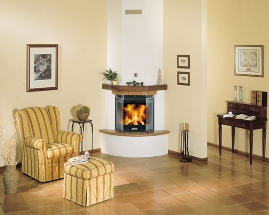 Фото 11 — Угловой камин из гипсокартона полукруглый - решение для тех, кто хочет скрыть угловатость комнаты