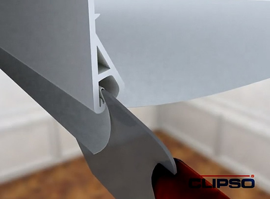 Закрепление полотна в профиль специальным шпателем