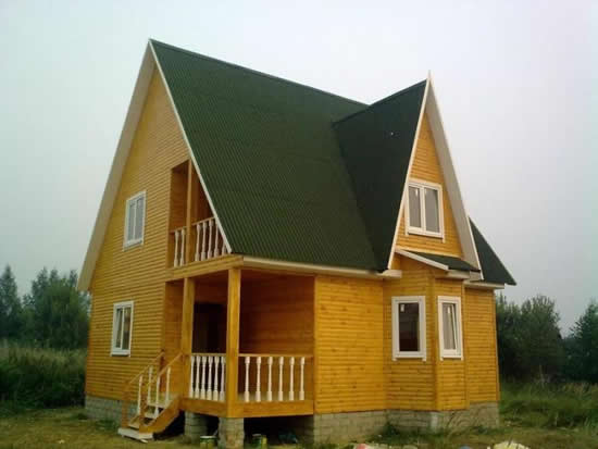 Фото 17 – Готовый домик для дачи из дерева