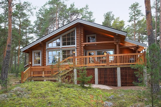 Фото 4 – Двухэтажный бревенчатый дом с удобной террасой 