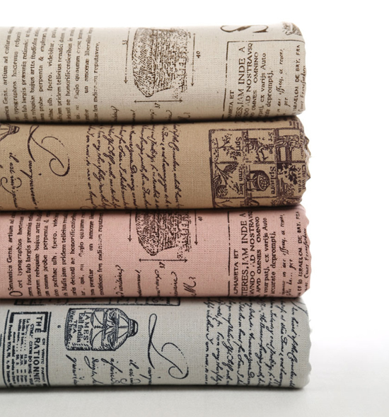 Газетный принт на ткани